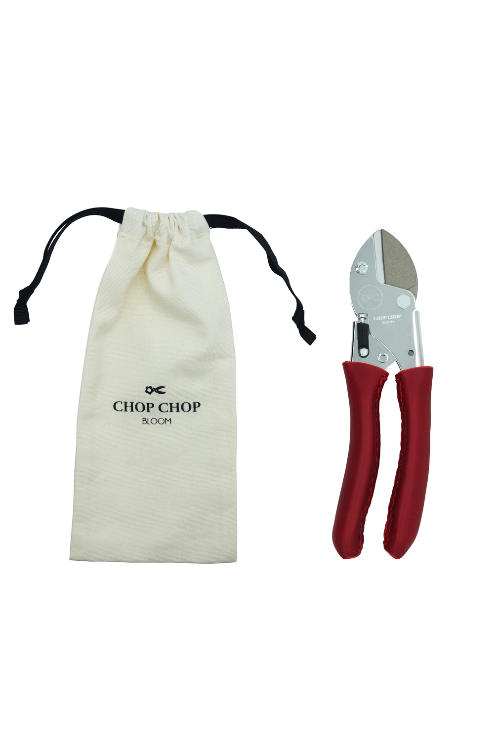 Geschlossene Gartenschere "Chili Pepper" von Chop Chop Bloom mit bordeauxroten Ledergriffen und Stoffbeutel.